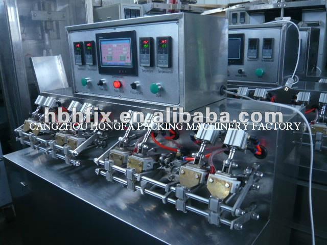 pure water /soy bean milk/fruit juice /beverage Full automatic filling sealing machine factory
