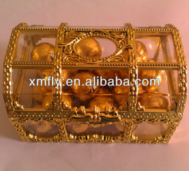 aluminium foil wrapped baseball shaped milka sweet chocolate balls