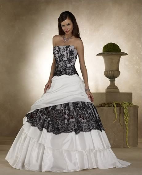 The stunning wedding dress in black and white is made of taffeta