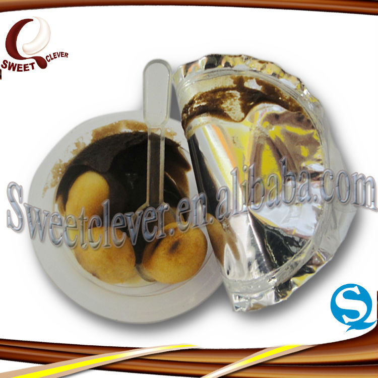 Shaped jar biscuit filled in cup sweet chocolate paste