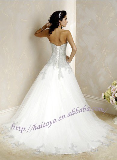 Strapless Aline silhouette tulle wedding dress with corset closure
