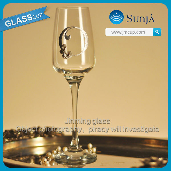 Hand painted personalized coupe champagne glasses with the Letters of