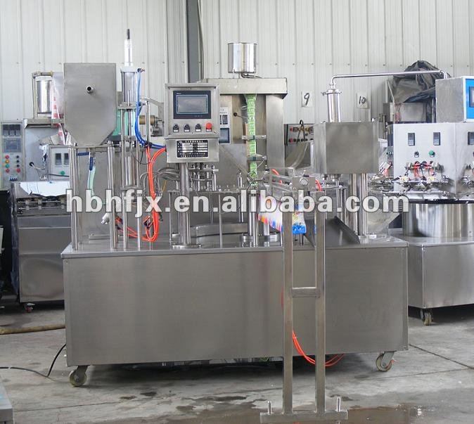 coconut milk water stand up pouch with spout doypack filling and capping small size machine with date printer