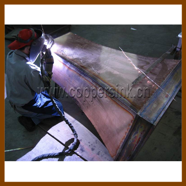 Hammered copper range hood for European Market