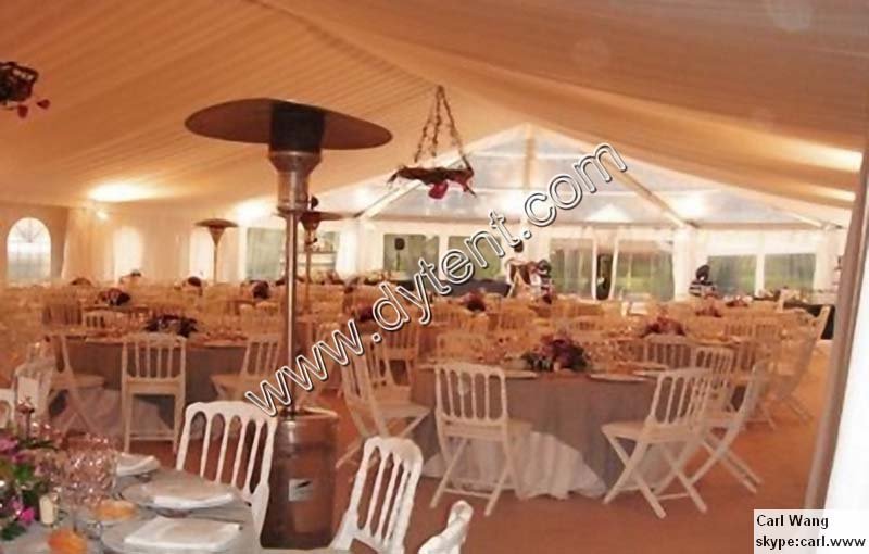white wedding tent suit with glass wallbanquet table and chairsheating 