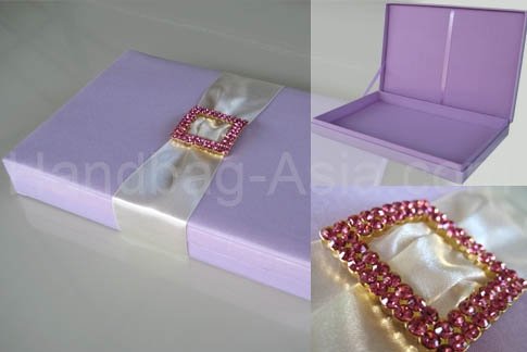 Exclusive wedding silk invitation boxes and silk favor boxes available here