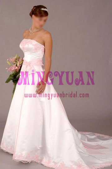 pink lace and ribbon on white satin bridal wedding dress