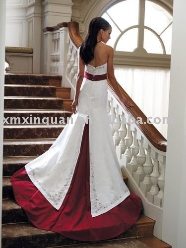  embroidered hem stain with fabric waistband long trailing wedding dress