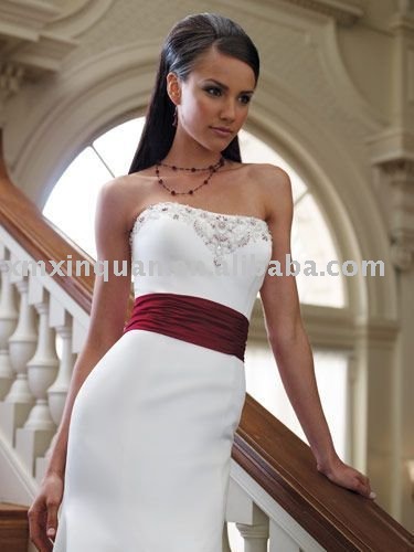  embroidered hem stain with fabric waistband long trailing wedding dress