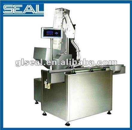 cap and lining assemble machine