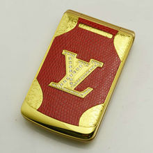 2013 Unlock girls luxury brand metal shell leather material flip phone women lovely dual sim card