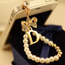 New arrival full rhinestone bow pearl pendant letter D dust plug 3 5mm universal phone accessories