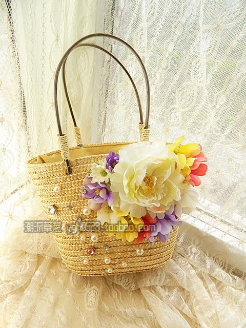 The new Korean version of the female flower handbag fashion straw bag beach resort