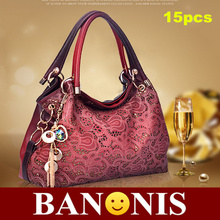 2014 new euramerican style hollow out heart shoulder bag, noble and fashionable women’s handbags, fashion joker tassel bag, 15 x