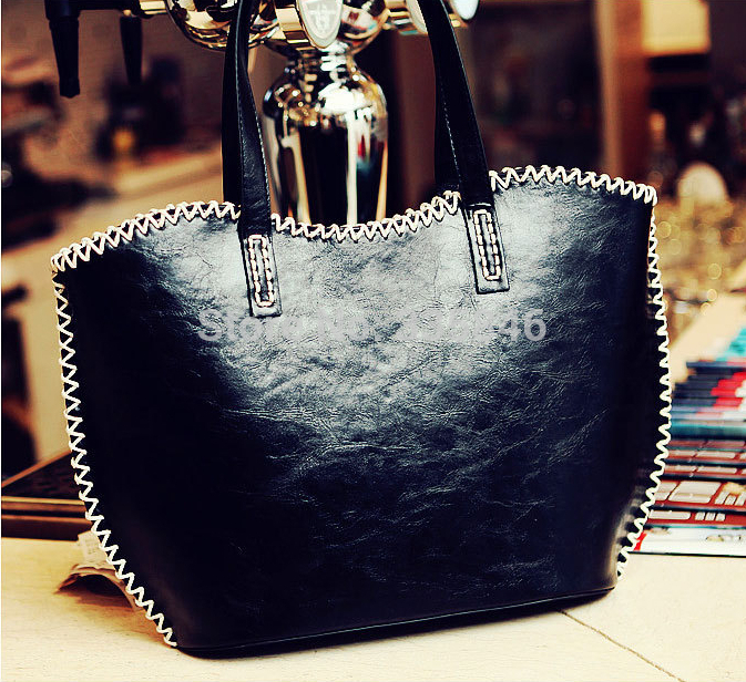 Autumn new weaving Europe and United States British women handbags fashion retro outermost layer of skin