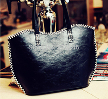 Autumn new weaving Europe and United States British women handbags fashion retro outermost layer of skin