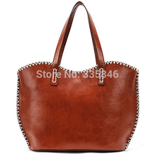 Autumn new weaving Europe and United States British women handbags fashion retro outermost layer of skin