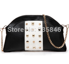 new 2014 Europe black and white matching bump color restoring ancient ways tide female bag rivet