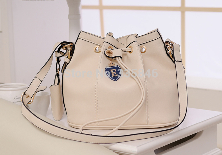 new 2014 female Japan and South Korea style great bucket bag With drawstring bag buckles boom
