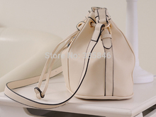 new 2014 female Japan and South Korea style great bucket bag With drawstring bag buckles boom