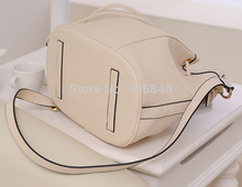 new 2014 female Japan and South Korea style great bucket bag With drawstring bag buckles boom