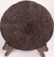 Seven cake cooked tea Old puer cooked tea 357 g trees pornographic films old leaves puerh