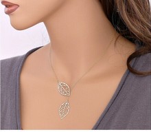 New fashin foreign trade jewelry contracted system Metal leaves Double leaf joker short chain necklace clavicle