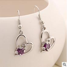 The new European and American fashion jewelry wholesale gift Cupid crystal earrings female Free Shipping