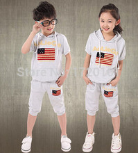 Retail free shipping the new 2015 kids clothes clothing set baby Both men and women