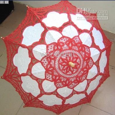 There are lace parasols in white black ivory and fans in whiteblack in