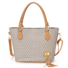 free shipping tassel fashion lady commuter shoulder leather handbag
