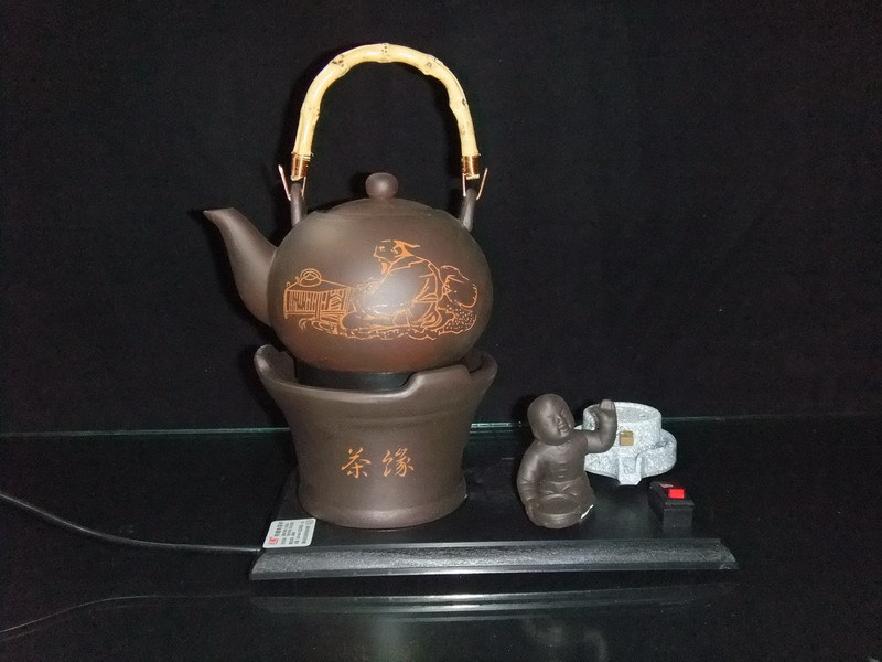 Is rice kettle authentic Taoran furnace antique ceramic tea Zisha teapot electronic zisha congou tea set