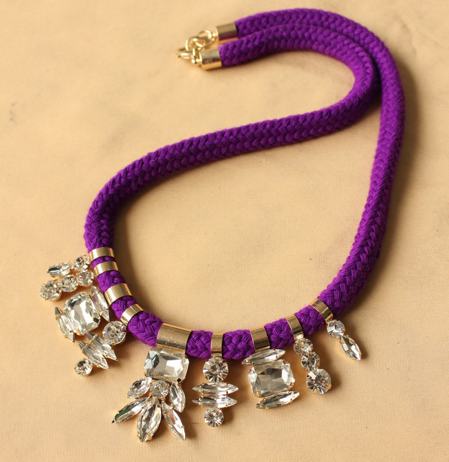 http://i00.i.aliimg.com/wsphoto/v0/754937780_1/NOir-Thick-Cord-bright-purple-Woven-Cotton-Chain-Gold-plate-Crystal-Necklace-9-Crystal-cluster-pendant.jpg