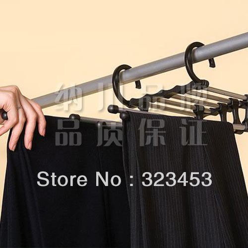 http://i00.i.aliimg.com/wsphoto/v0/759669278/High-Quality-Stainless-steel-Magic-trousers-hanger-rack-multifunction-pants-closet-hanger-49-23cm-yphb-Y34536.jpg