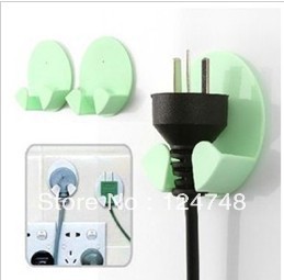 Hot selling + Free shipping Magic multi-function Socket storage holder&rack with sucker , socket accessory,2pcs/lot(China (Mainland))