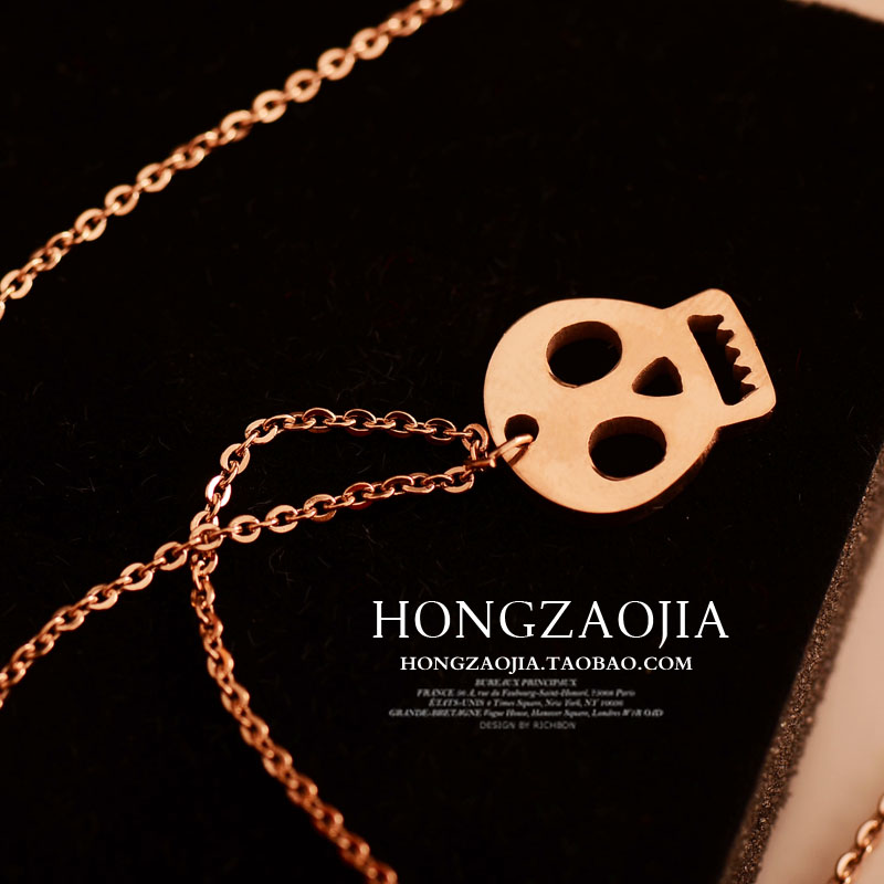Free shipping for new arrival-- Dates 18k rose gold skull necklace female color gold chain colnmnaris titanium steel pendant(China (Mainland))