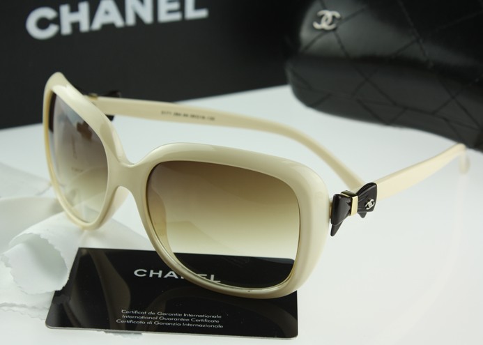 Wholesale white frame big frame glasses of lady's vogue of the current classic be partial to light bowknot sunglasses(China (Mainland))