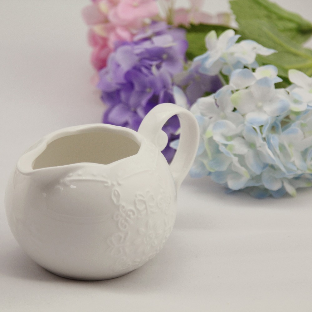 Free shipping New Zakka White lace butterfly embossed ceramic milk jug Sugar Pot Storage tank Family