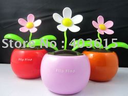 3pcs/lot Magic Cute Flip Flap Swing Solar Flower,Green,Blue,Pink Plant Solar Toy Free Shipping(China (Mainland))