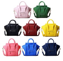 2014 European and American women’s handbag fashion Phantom smiley shoulder bag High quality mini smiling face handbag GG030